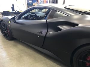 フェラーリ488GTBマットブラックフルラッピング施工完成左後ろから