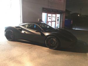 フェラーリ488GTBマットブラックフルラッピング施工完成ガレージ外